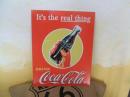 T1053   Coke-Real thing-Bottle in Hand